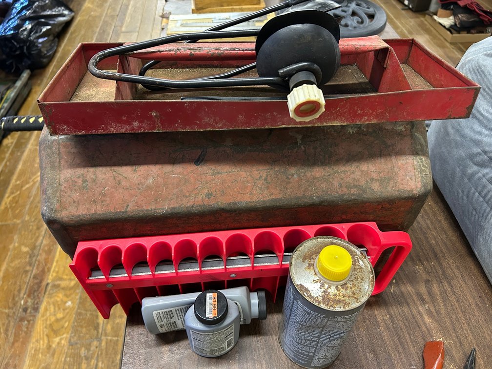 Metal Tool Box, Various Hand Tools, Automotive Fluids, Stop Leak, Filter Wrenches, Strap Wrenches, Sockets, Flashlight, Out Board Engine Tools