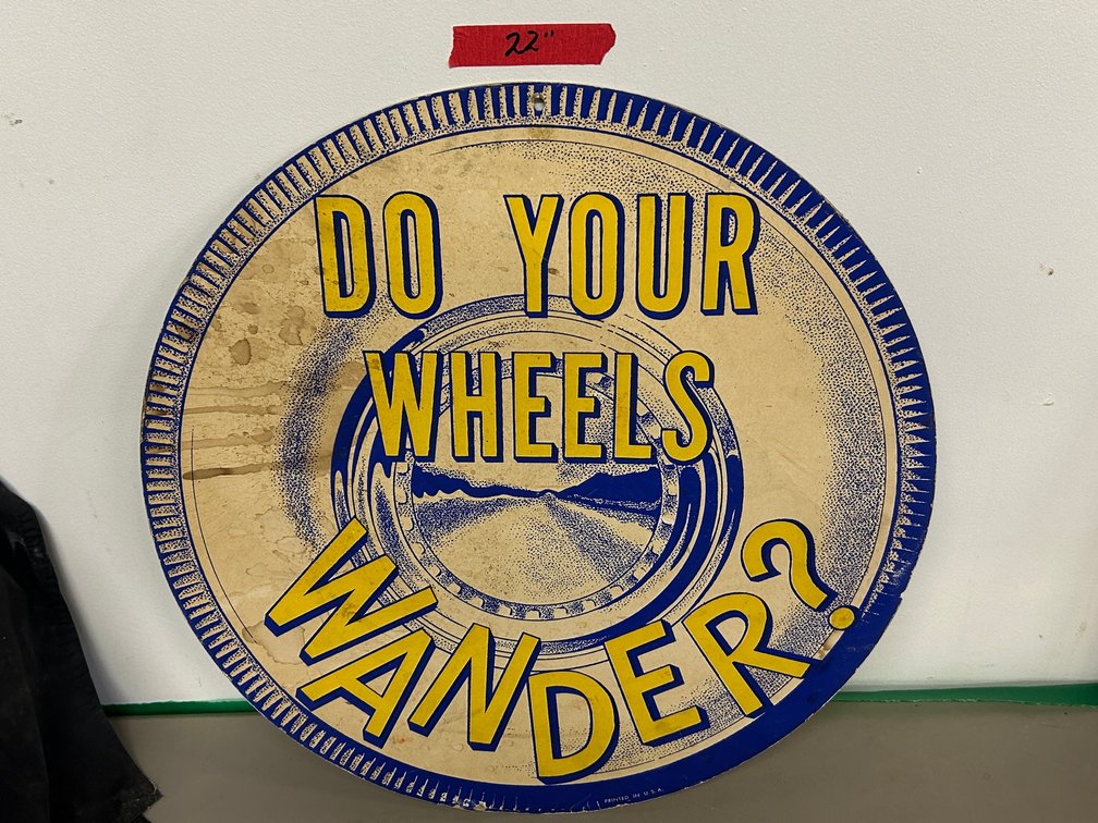 22 inch Cardboard Sign "Do Your Wheels Wonder"