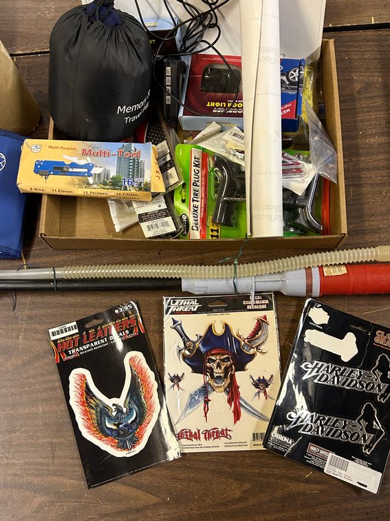 Harley Decals the Multi Tool, A door Lights, Travel Pillow, Allstate Package for Accident Details