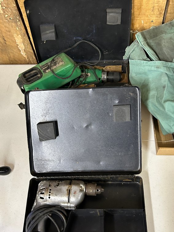 Black and decker Electric Drill in a DeWalt Box, Hitachi Battery Drill