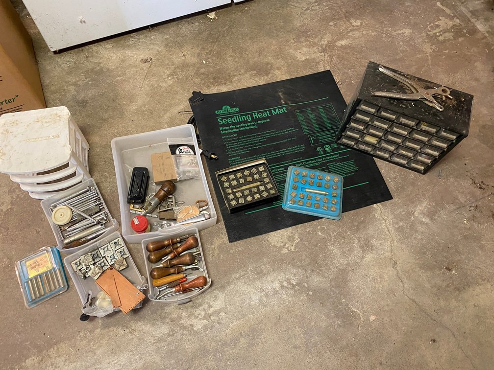 Hydro farm Seedling Heat Mat, leather Punching Supplies, A Small Parts Bin with Assorted Hardware