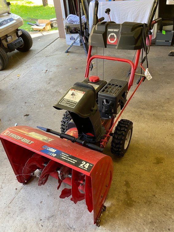 Troy Bilt Model Storm  2410 Snow Blower Electric Start 6 Forward Speeds-2 Reverse Speeds Reenforced Steel Housing 24 Inch Wide Cutting Width 179 CC Engine