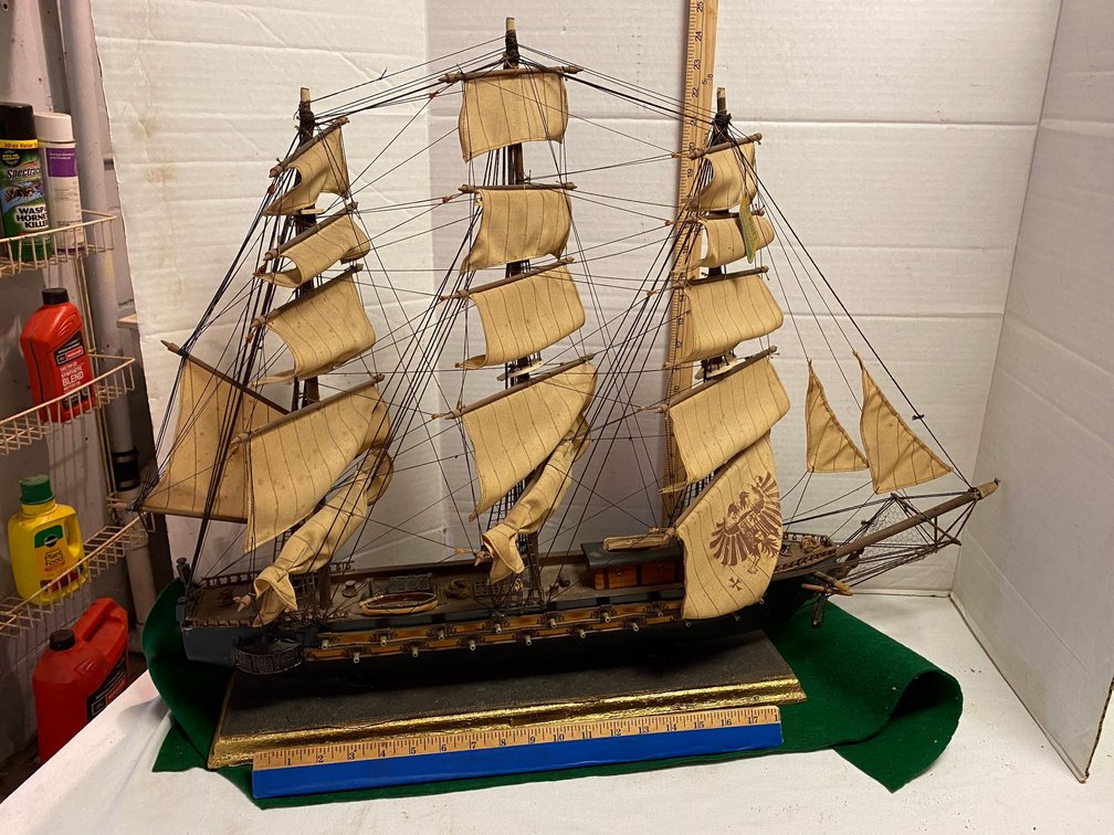 Antique Replica  of  Fragata  espanola 1780 with a Tag that says Cornial Millers Spanish Gifts Madrid's Spain