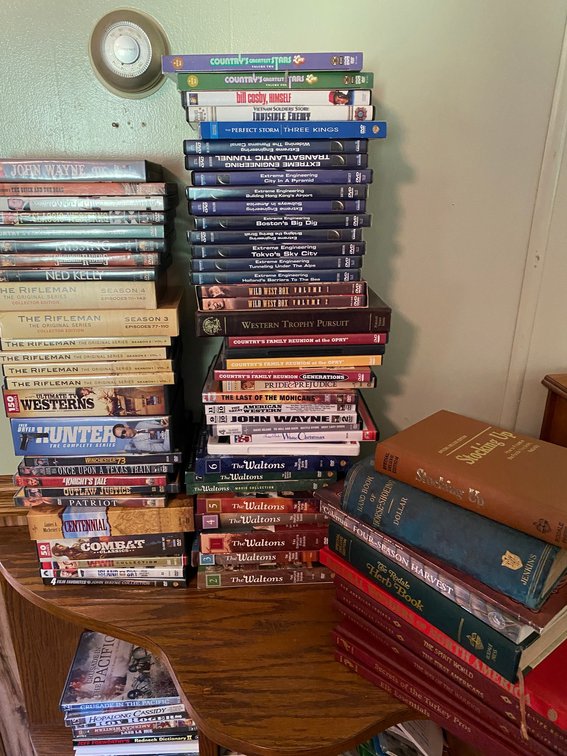 Large Assortment of DVD's, VHS, Books