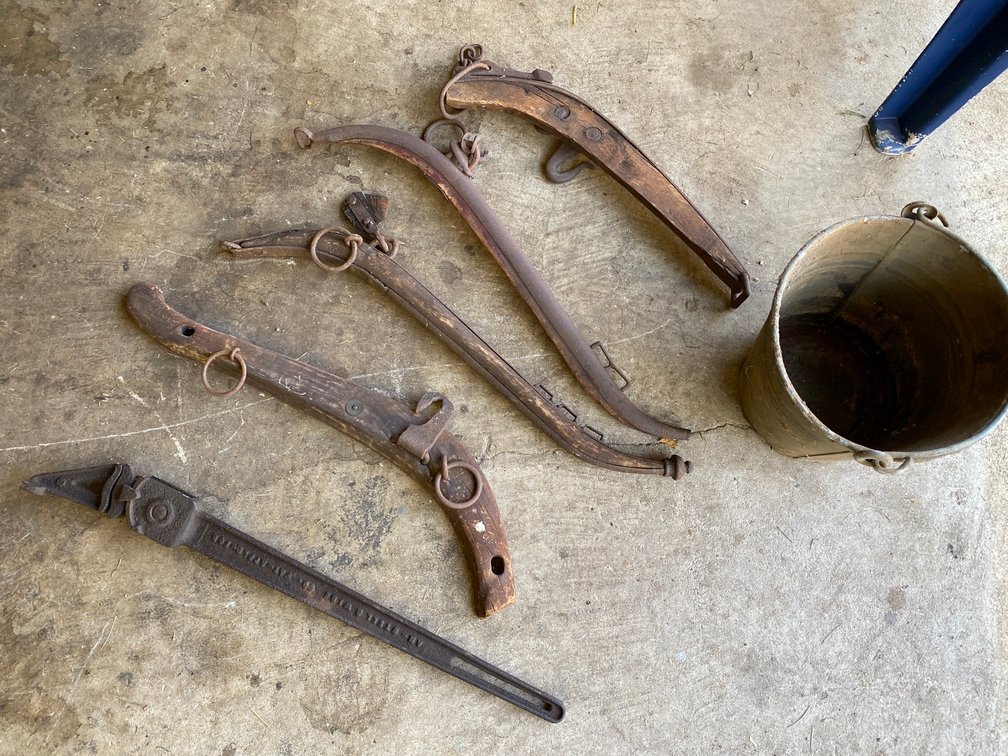 Horse Hames, a Wire Fence Stretcher, Bucket