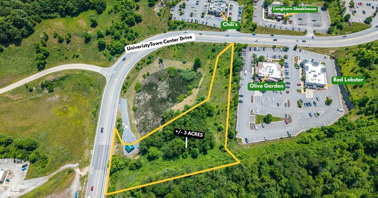 Image for 138 Acres Surrounding the University Town Centre Selling to the Highest Bidder