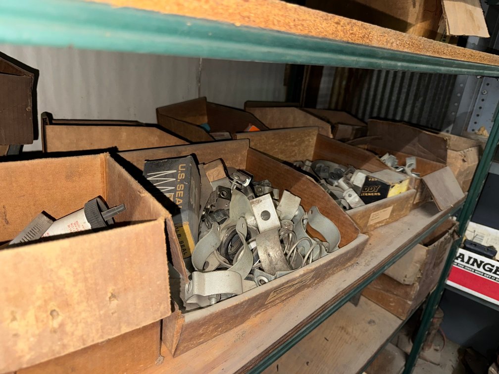 Wooden bin filled with Various Hardware