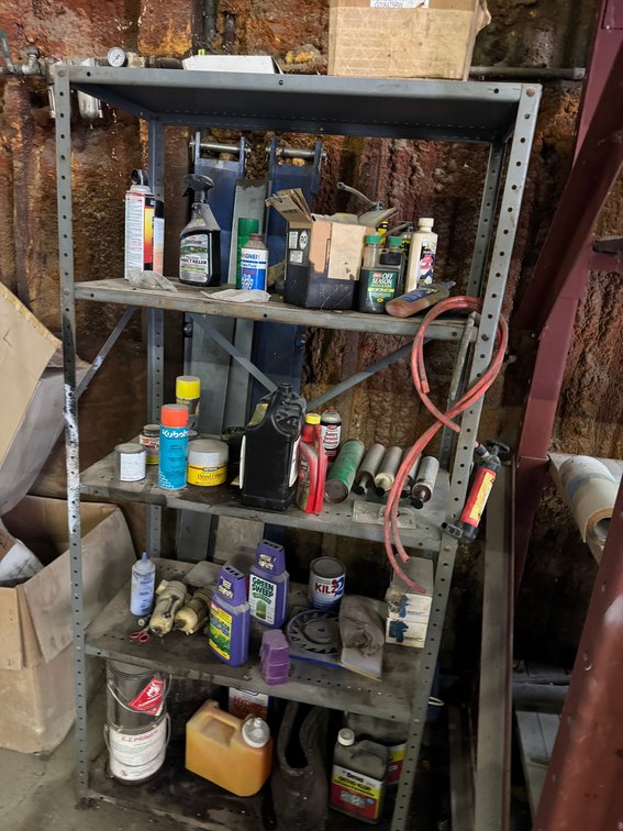 5-Shelf Grey Metal Storage Rack with contents