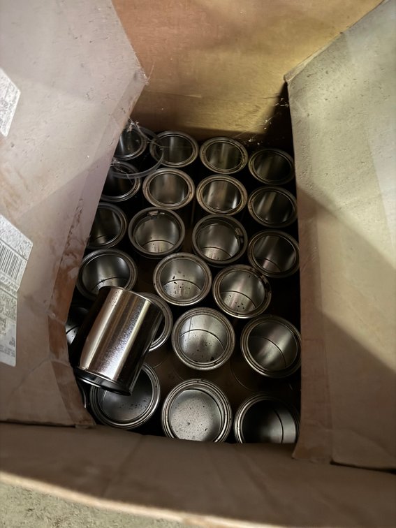 Box Containing  Blank Aluminum Cans