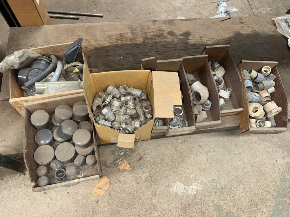 Container of various PVC Conduit Fittings