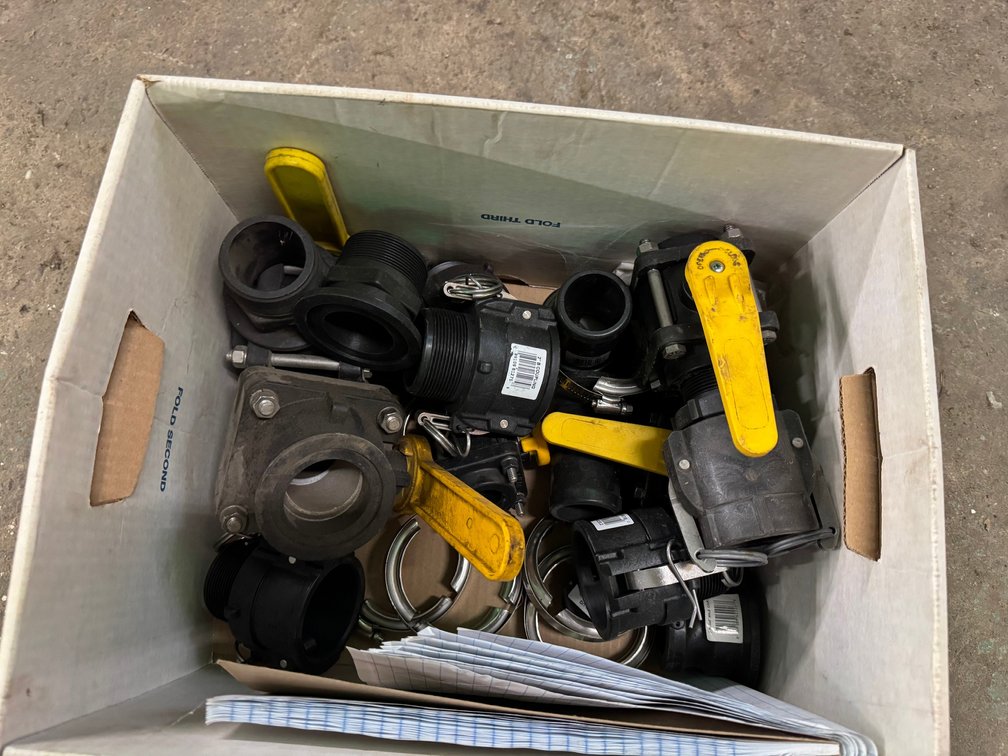 Box Containing Several Industrial Grey Valves
