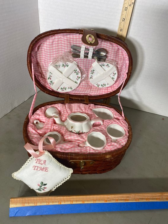 Child's tea set in a picnic basket