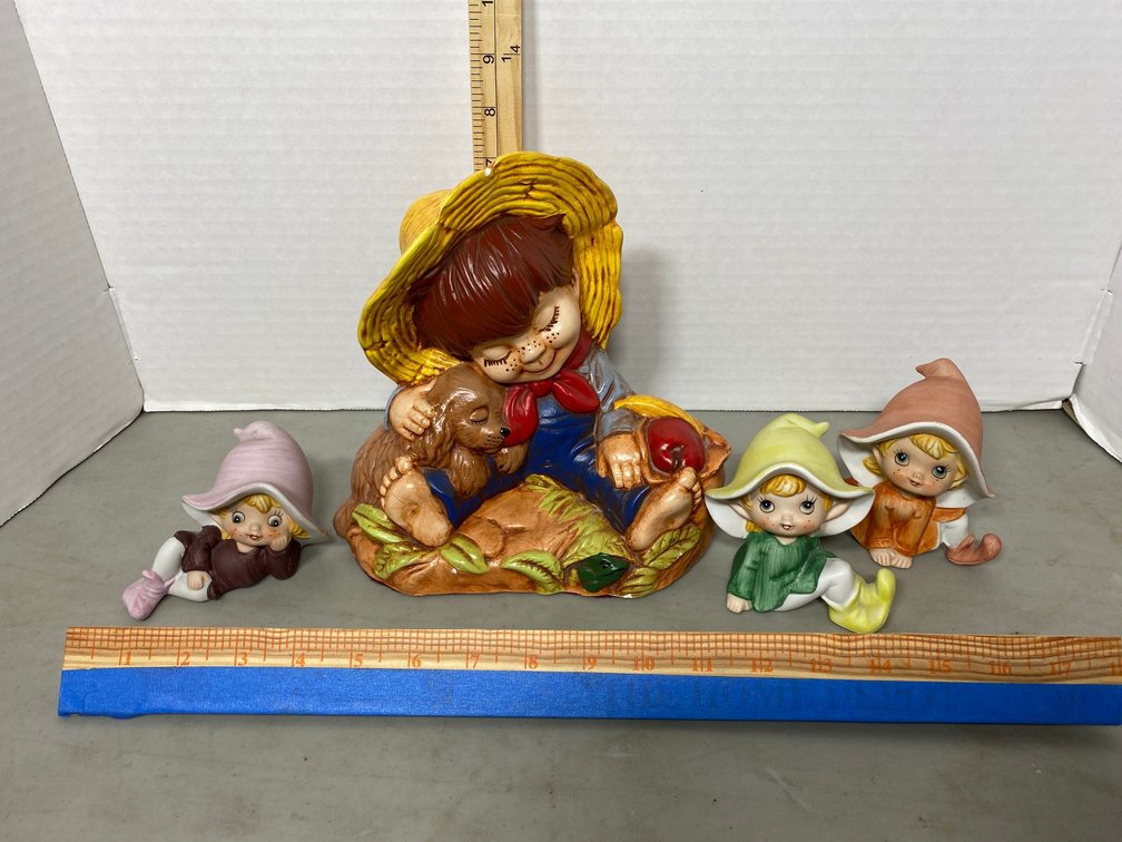 Home decorator ceramic elves, boy with dog-has chip, basket
