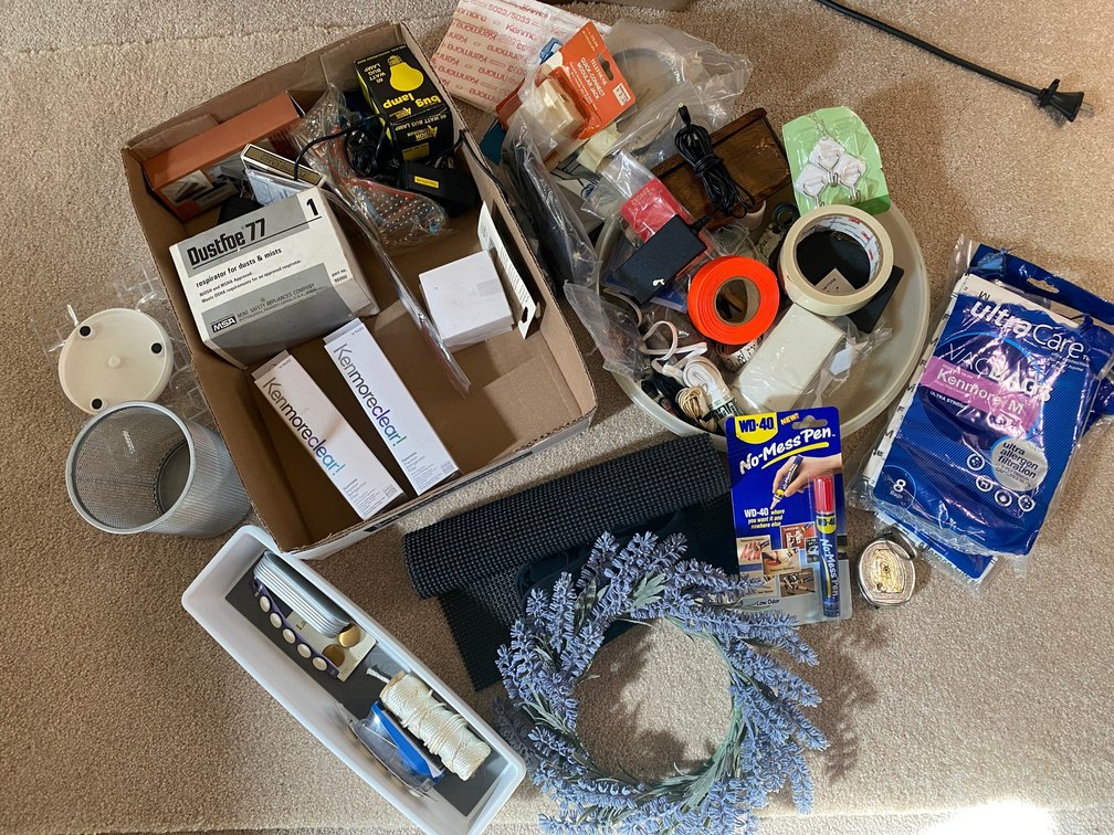 Marking tape, vacuum cleaner bags, WD40 No Mess pen, dust masks, shoe laces