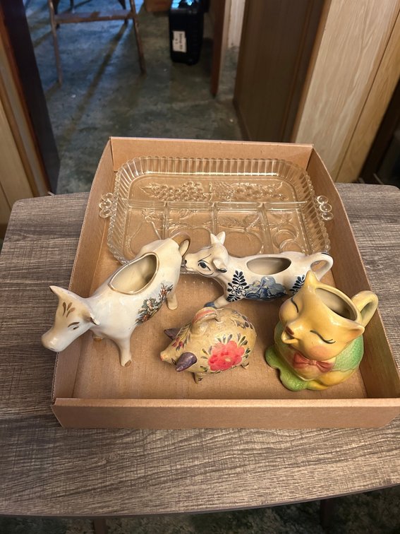 Creamers, including Shawnee cat, glassware