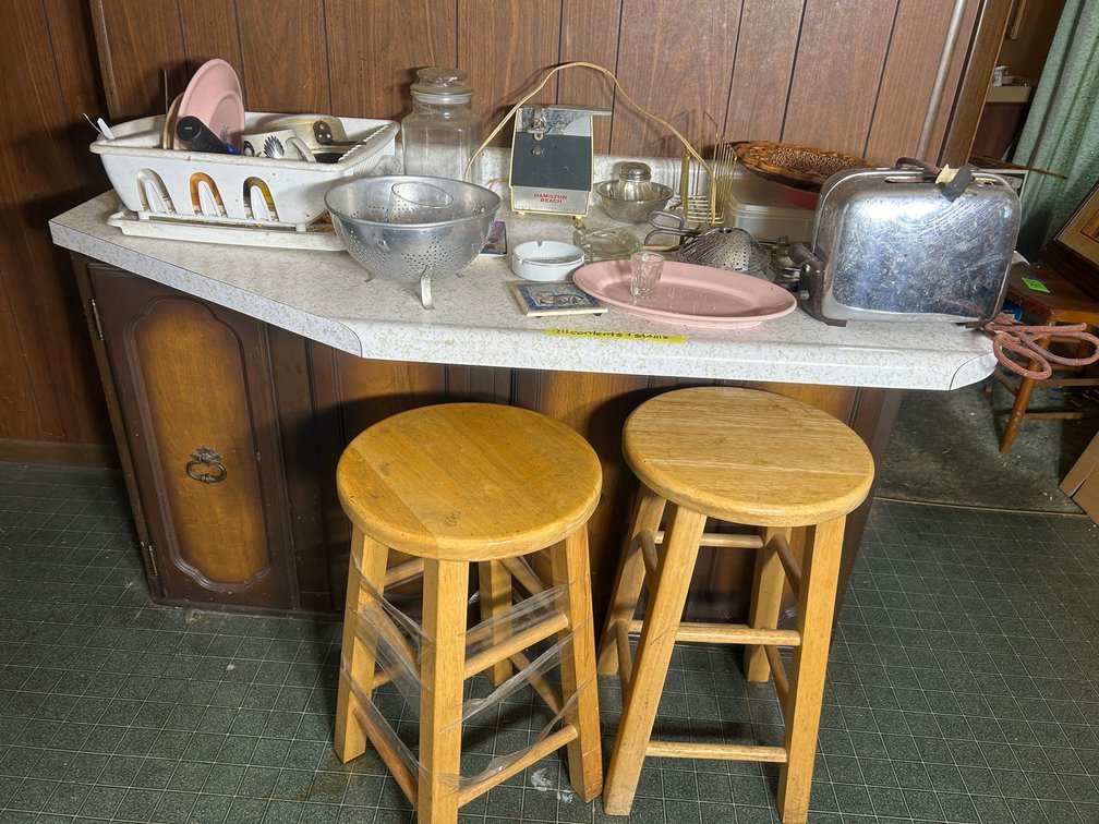 Barstools, toaster, can opener, many kitchen items