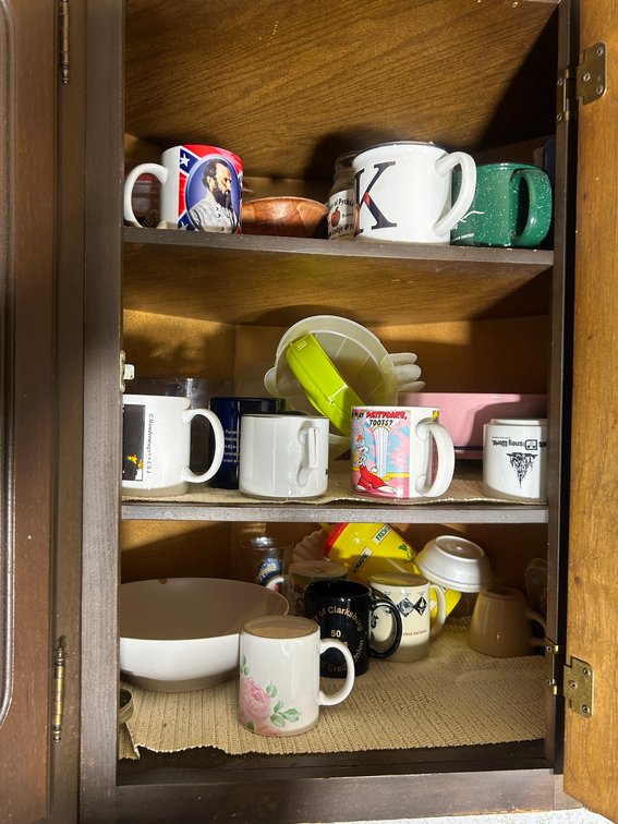 Cups, contents of cabinet