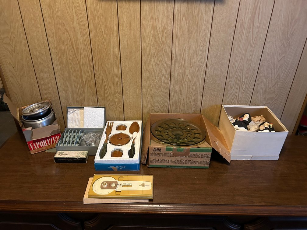 Nuns, green serving dish, vaporizer in box, wooden utensils, misc.
