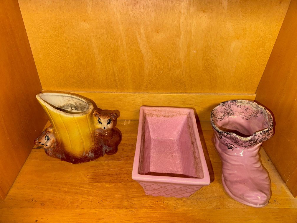Decorative planters including a bear cub in tree stump planter-possibly 1940-1950's bisque