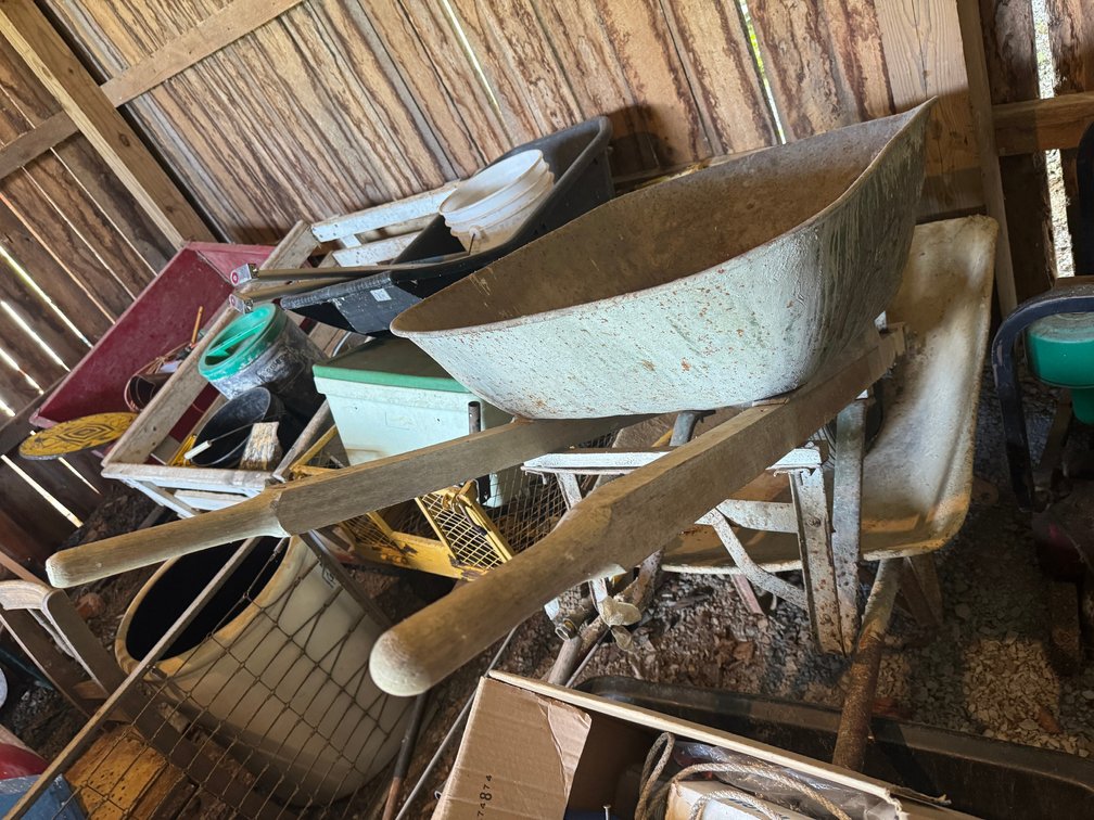 Deep Wheelbarrow with Pneumatic Tire & Antique Wheelbarrow with Steel Wheel