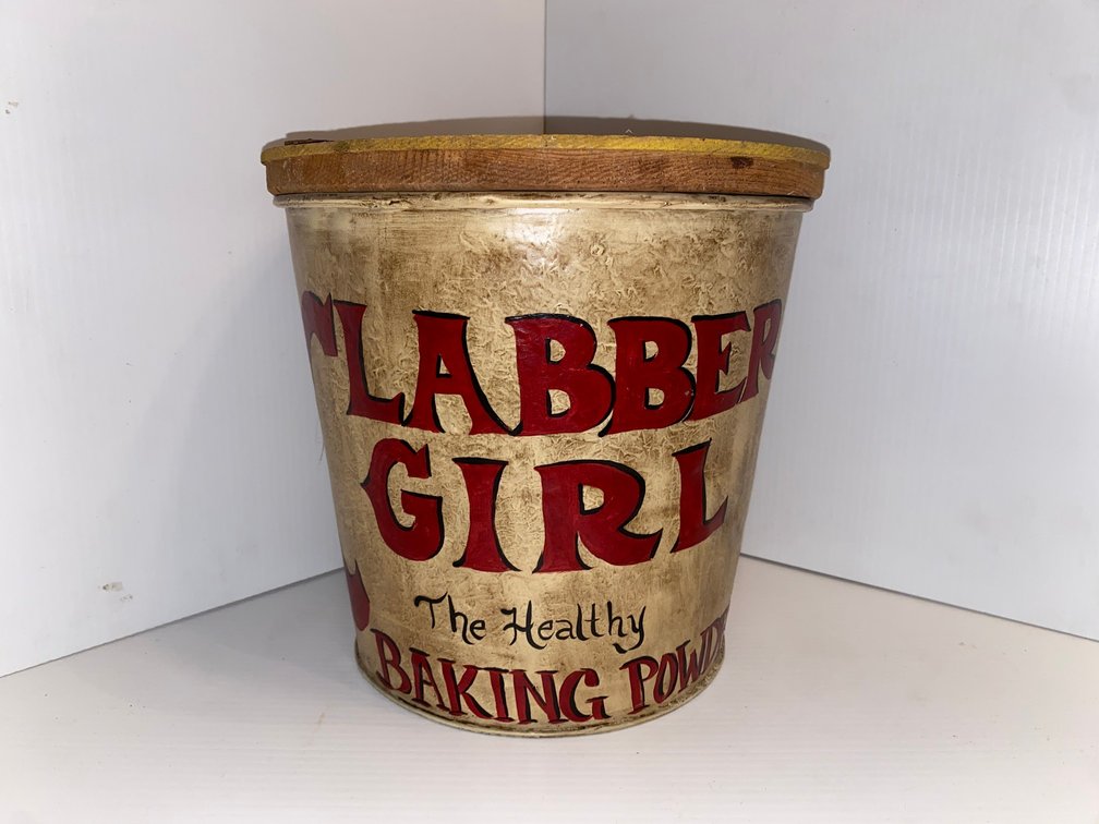Tub with wooden top-marked Clabber Girl, the Healthy Baking Powder