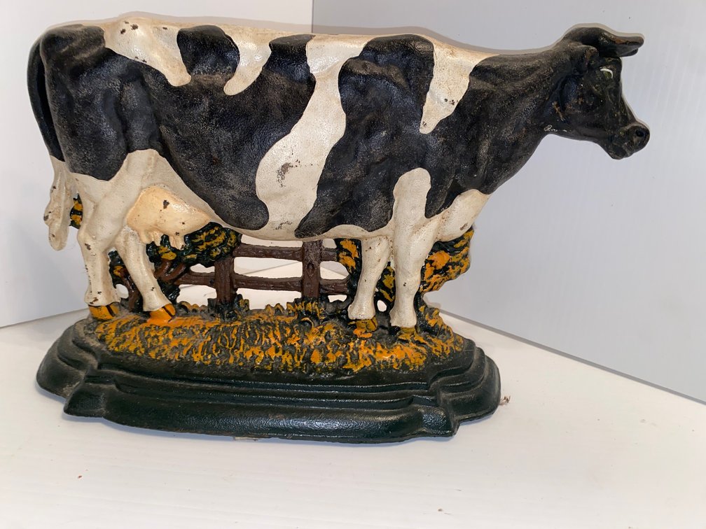 Cast iron cow door stop
