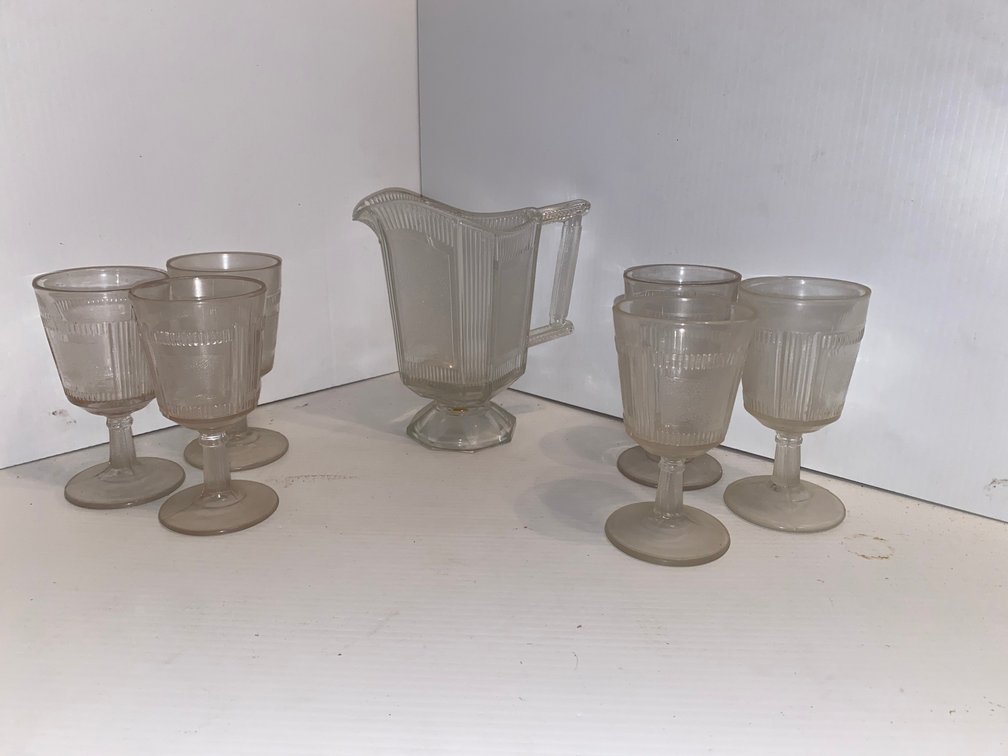 Pitcher with matching glasses of antique EAPG Bryce Brothers Derby Pleat goblets