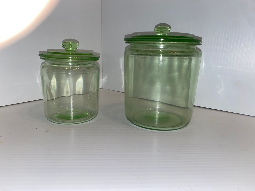 Vintage 1930's green depression glass, or uranium glass lidded storage jars