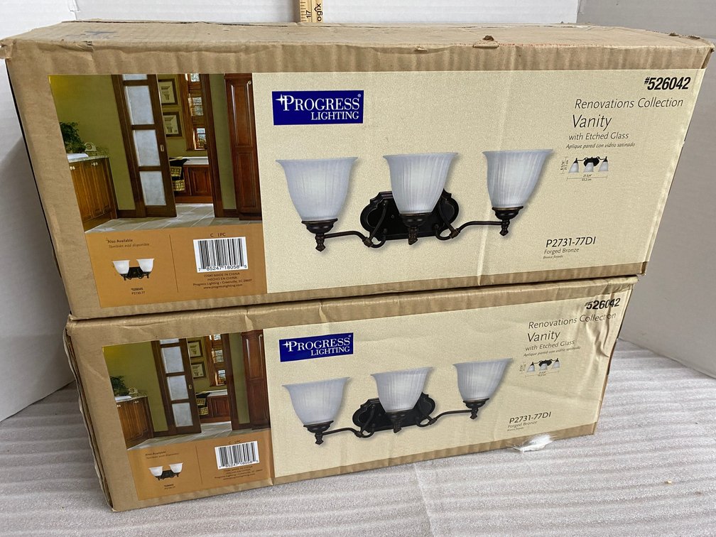 2 Progressive Lighting Renovations Collection vanity light fixtures with etched glass globes