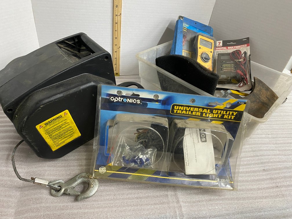 12 Volt winch-no control or power leads with it, 2 multi-meters, trailer license plate holder only-no lights, misc. hardware
