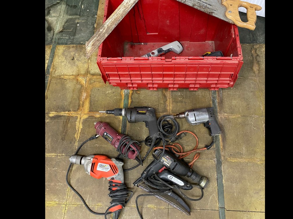 Assortment of electric drills, handsaws, heat steaming iron