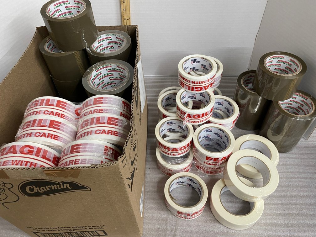 Rolls of tape-some say Fragile-Handle With Care