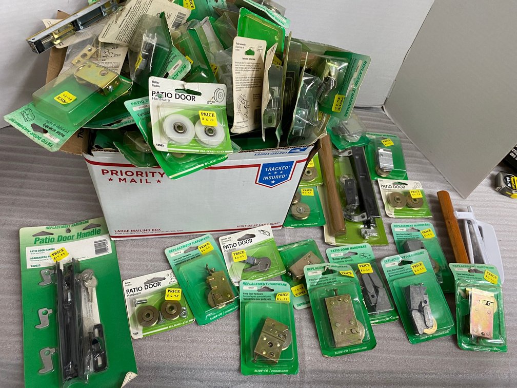 Assortment of patio door hardware, rollers, handles