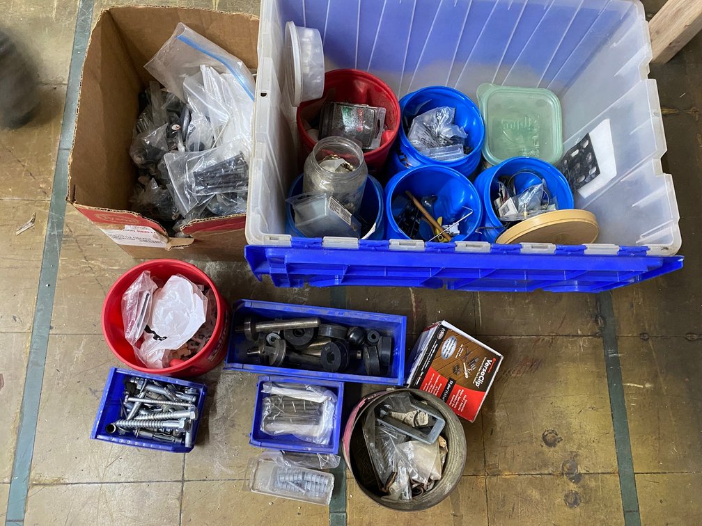 Assortment of hardware-bolts, screws-in a tote with attached lid