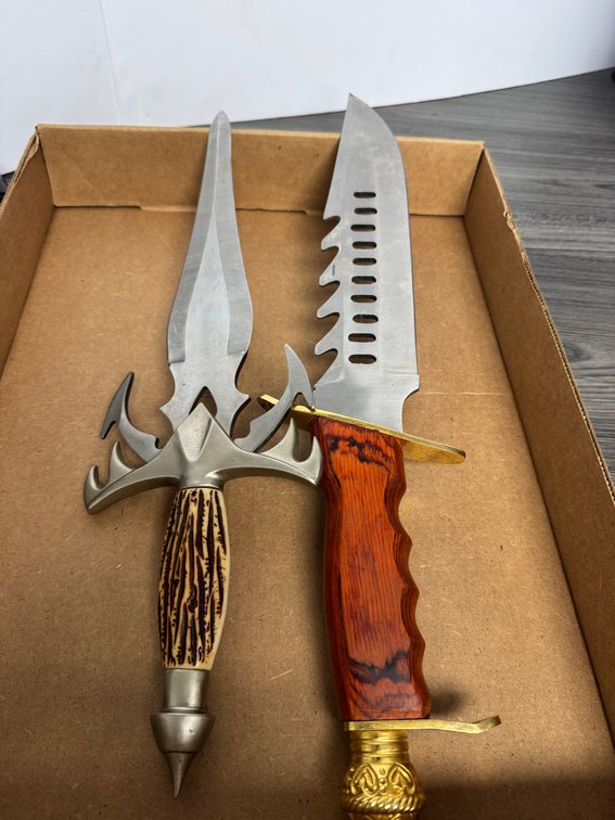 Fantasy Art Daggers, one is Jim Frost