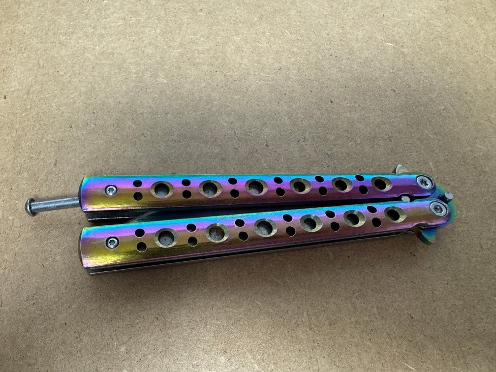 Rainbow colored butterfly knife