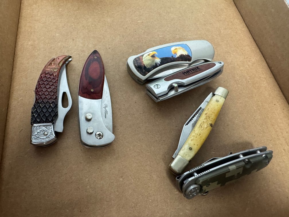 Variety of novelty folding pocket knives
