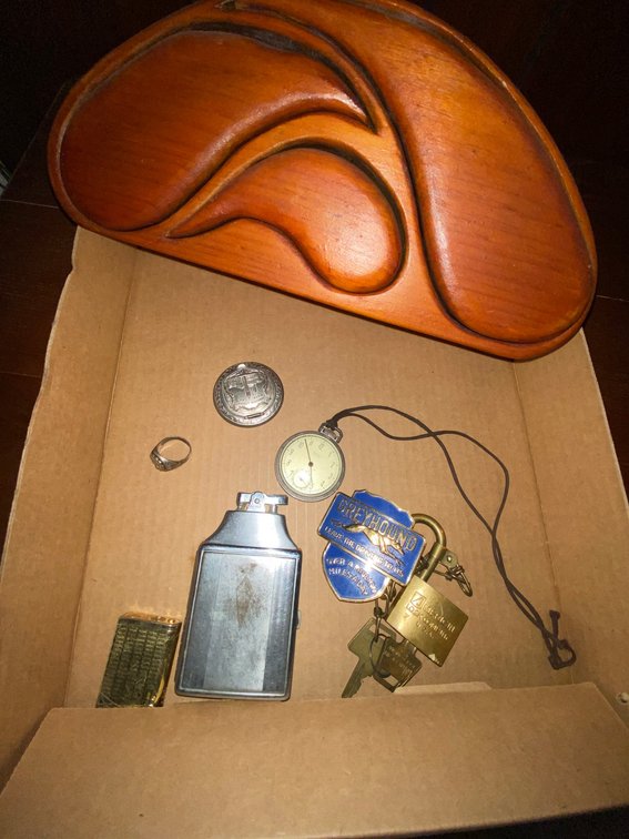 Flat with large lighter, Greyhound pins, Greyhound ring