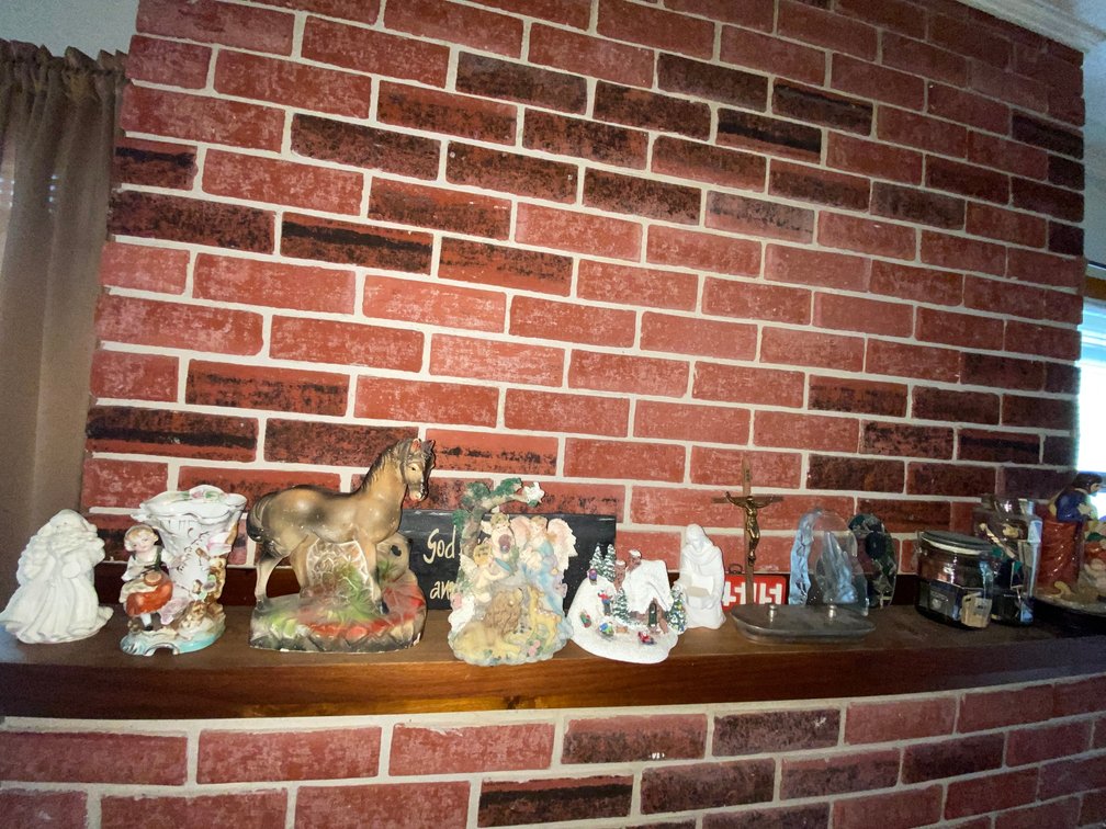 Contents on mantle-knickknacks and figurines