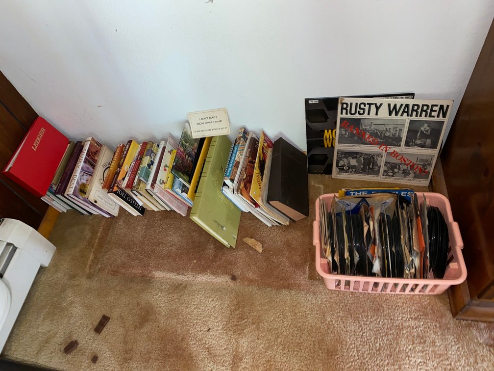 Assortment of books, 45 vinyl records