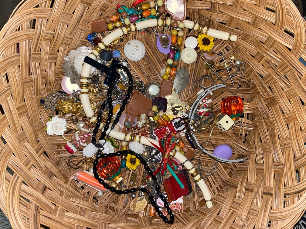 Basket of costume jewelry