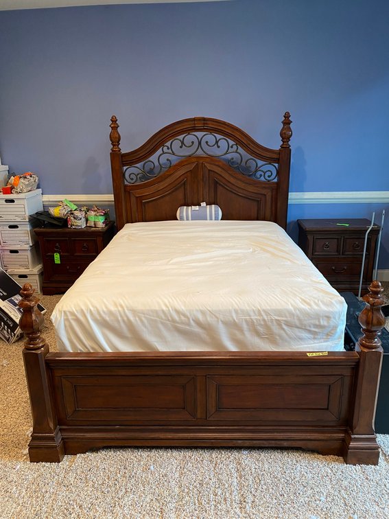 Full size bed with headboard and footboard