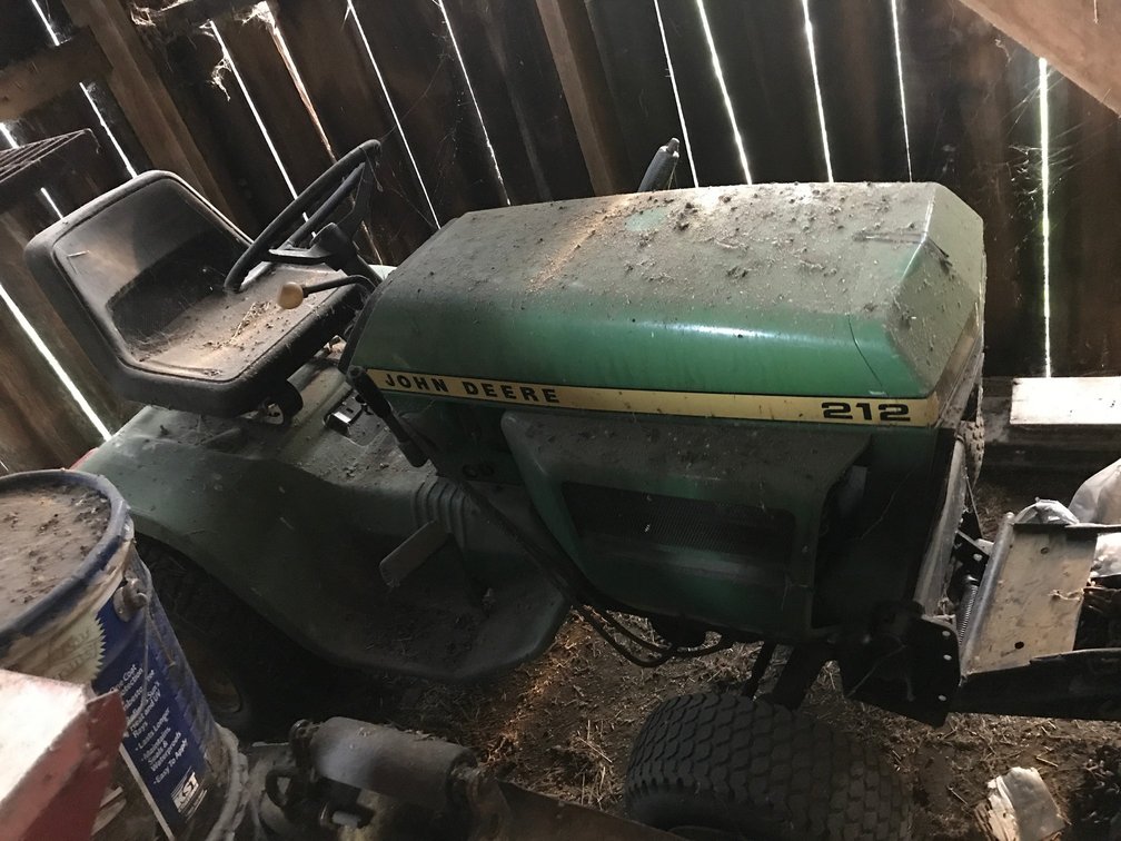 John Deere 212 riding mower with blade and deck