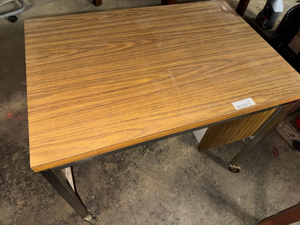 Wooden rolling desk with door and shelves
