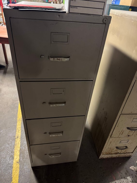 Two 4 drawer filing cabinets