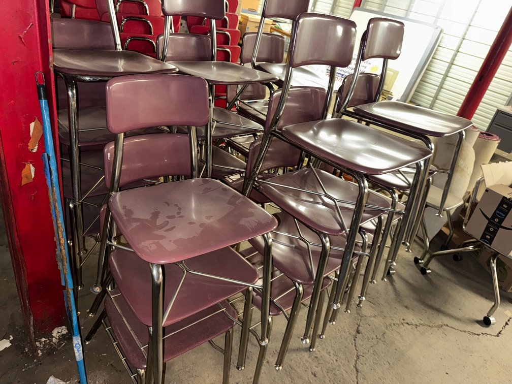 Collection of metal classroom chairs