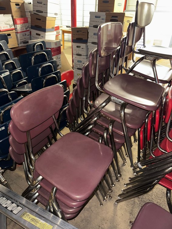 Collection of metal classroom chairs