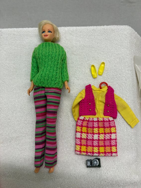 Twiggy dressed in Vested Interest with High Riders Outfit