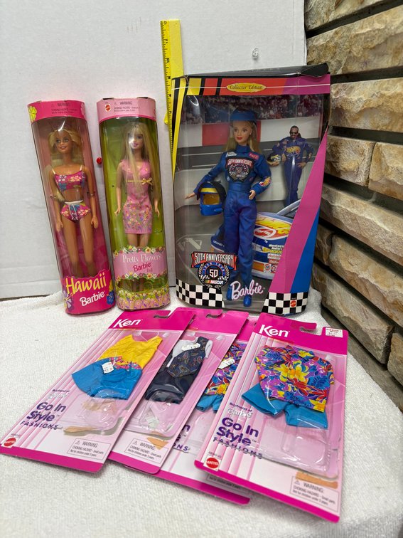 3- Boxed Barbies and Outfits