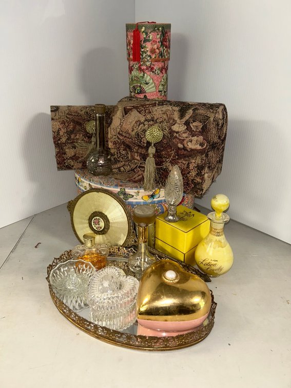 Ladies' dresser items including two trinket boxes and hand mirror